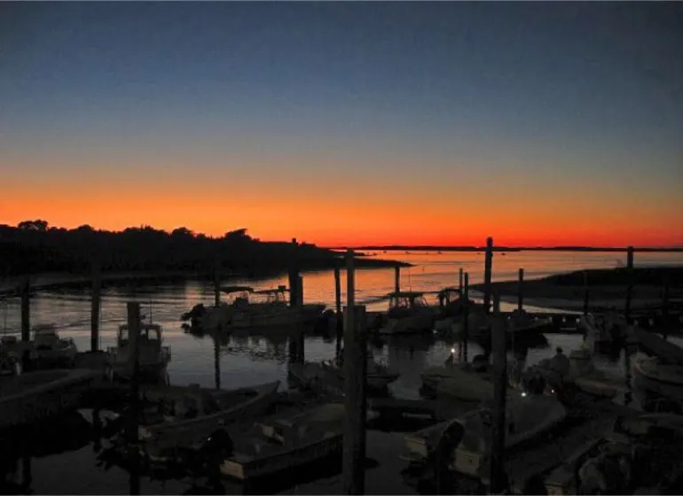 Late sunset with silhouetted shoreline