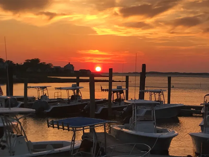 Sunburst over the harbor and docks